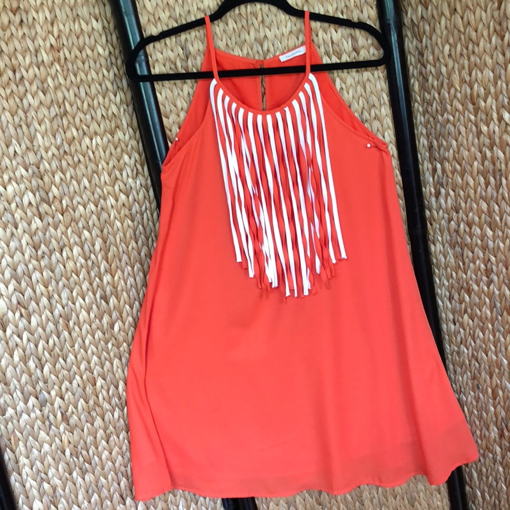 Fascination orange strap dress, with fringe trim. Great condition. Size Medium.